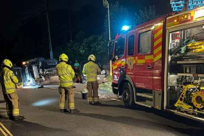 Two injured in three-vehicle crash which flipped car