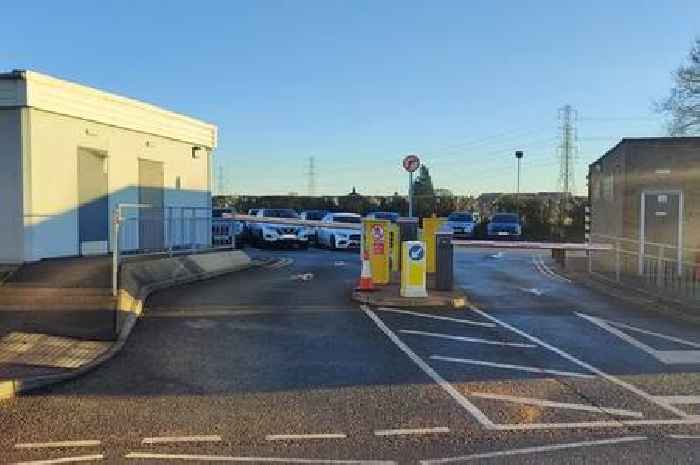 Police called to hospital car park as dogs left in car in heat of 'glaring sun'