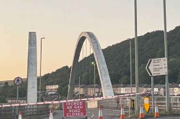 Man killed in crash between car and van on bridge