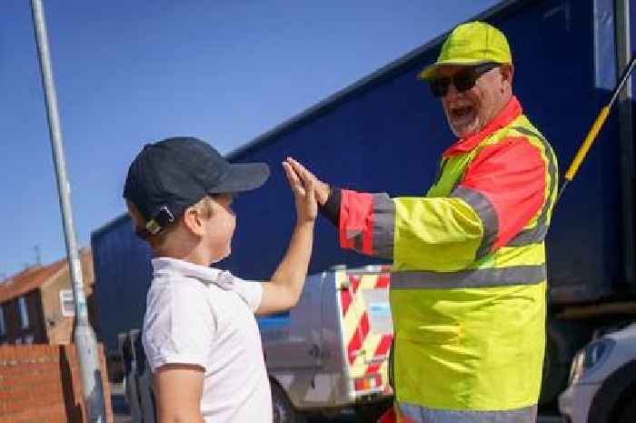 School lollipop man told he can't 'high five' children when they cross the road