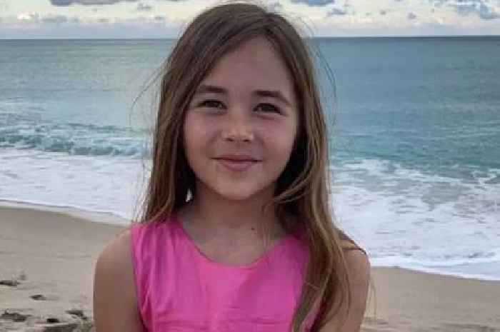 Shark attack horror as schoolgirl walks out of sea with no hand