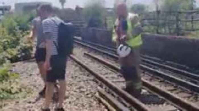 Train passengers evacuated as temperatures soar
