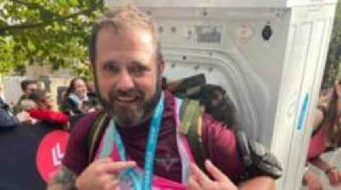 Runners carry washing machines in fundraiser's memory