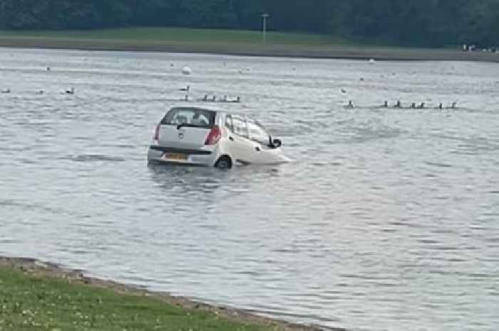 Car sinks after rolling into loch at Scots country park as man charged