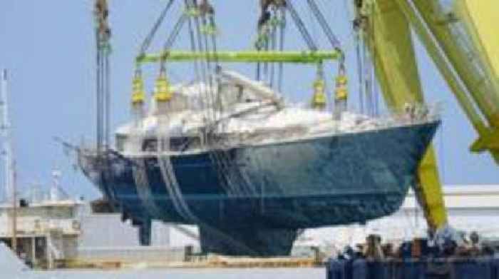 Wreck of $30m yacht which sank and killed seven lifted from seabed in Sicily