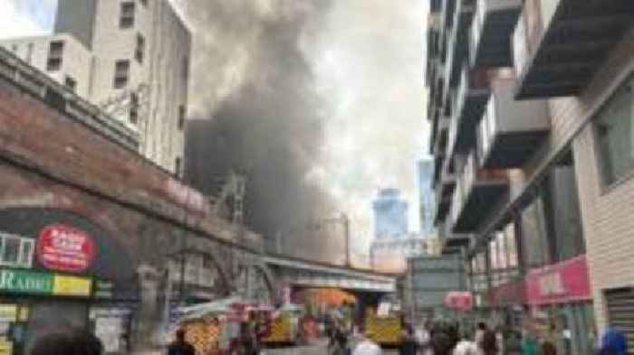 Major fire sees buildings evacuated and trains halted
