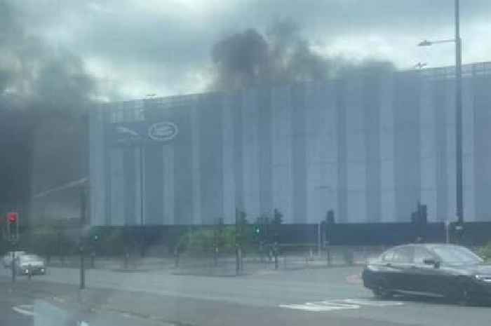 Jaguar Land Rover fire live as emergency services rush to scene