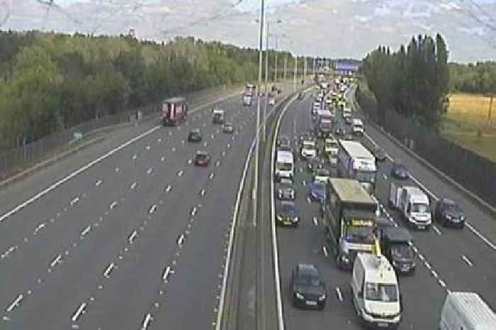 Live M25 traffic updates with delays near Chertsey after crash between van and motorcycle