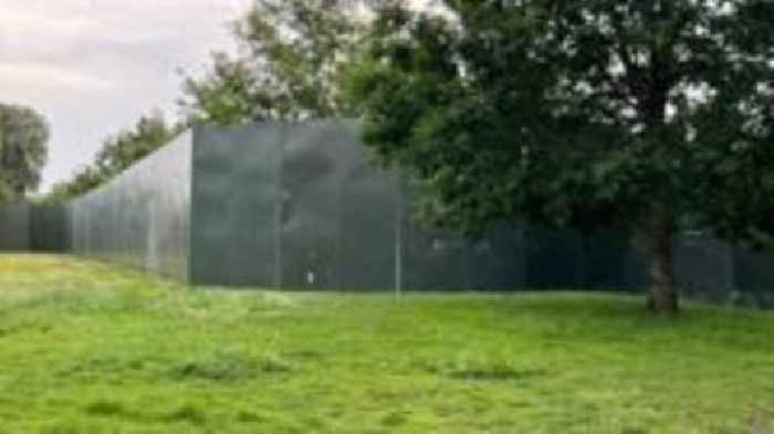 Large fences shut off popular park for gigs