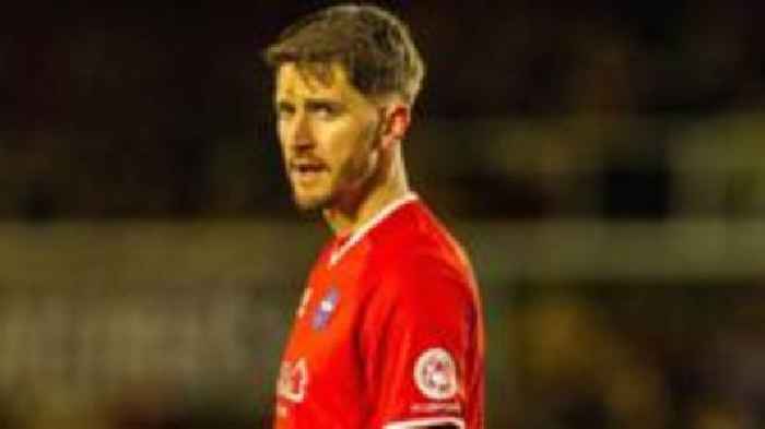 McDonnell returns to Wimbledon on two-year deal