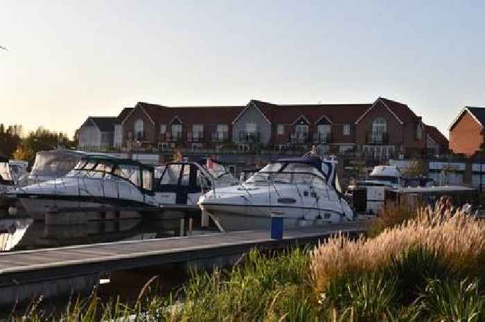 Plans for family homes in childfree village called 'totally out of character'