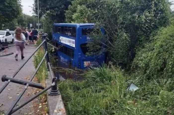 Bus carrying school kids crashes through railings into river as 17 injured