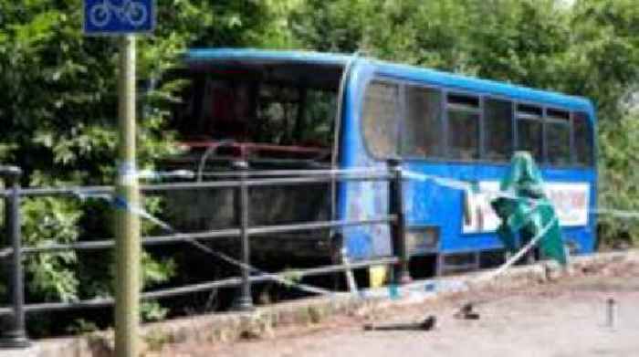 Two seriously injured as bus carrying college students 'careers into river'