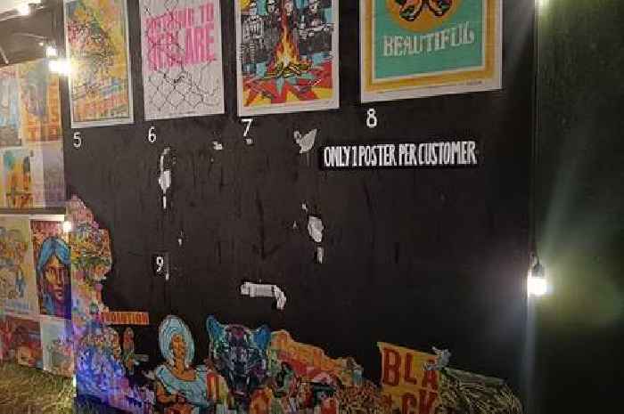 'Banksy poster' at Glastonbury Festival mysteriously disappears from display