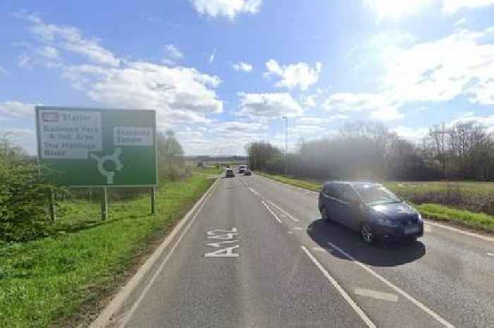 Overturned caravan blocks busy Cambridgeshire road