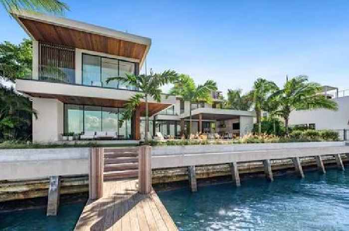 F1 legend Eddie Irvine puts mega mansion with shaded cabana up for sale for whopping £27million