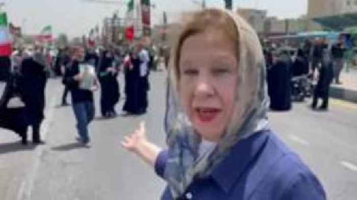 Watch: Anger and uncertainty in Iran as crowds mourn dead