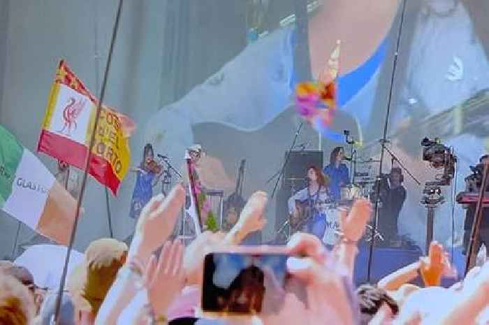 Tragic story behind flag spotted at Glastonbury