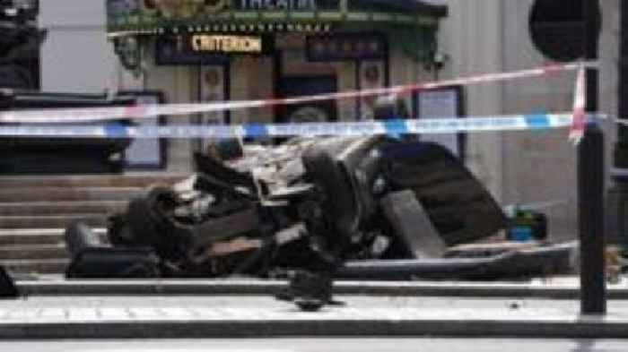 Two injured as car overturns in Piccadilly Circus