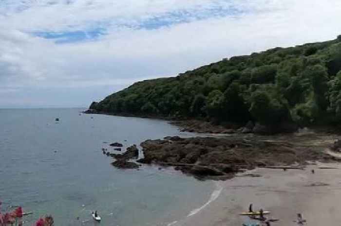 Man falls from cliff and lies injured and stranded all night on beach near Cawsand