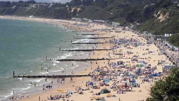 UK 'to be hotter than Barbados' with temperatures set to hit a record-breaking 34C