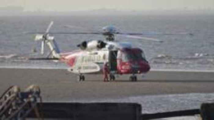 Eight rescued after getting cut off by beach tide