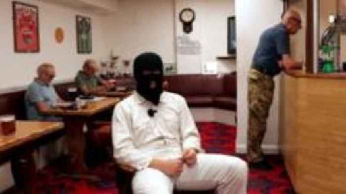 Masked band step in to save social club