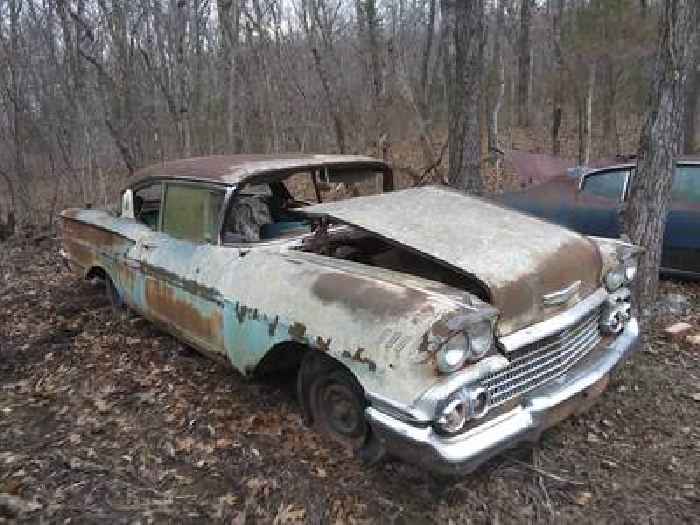 This 1958 Chevy Bel Air Has Nowhere To Go, so It Sits in a Junkyard. Still Worth a Chance?