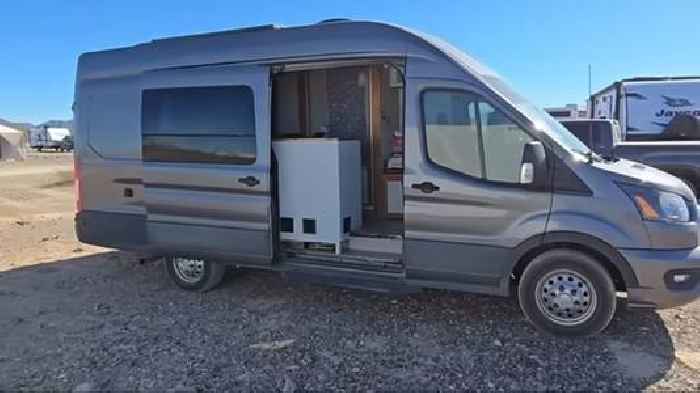 This DIY Camper Van With an Ingenious Shower and Sliding Bed System Is Perfect for Vanlife