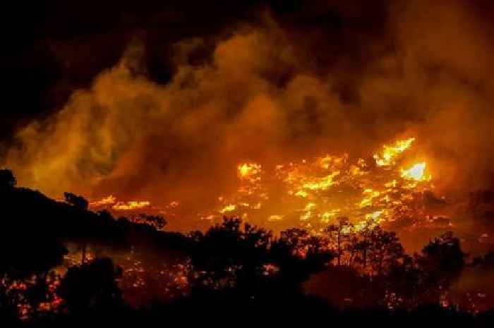 Greece wildfires spark mass evacuations in Crete as blaze rages on holiday island