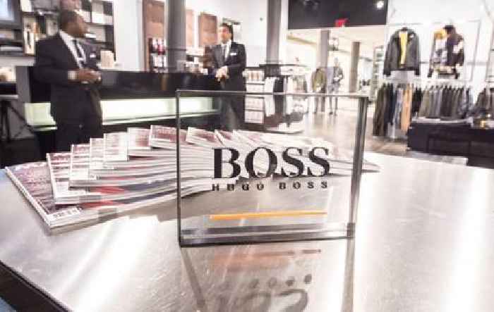 Mike Ashley tightens grip on Hugo Boss amid dividend demand