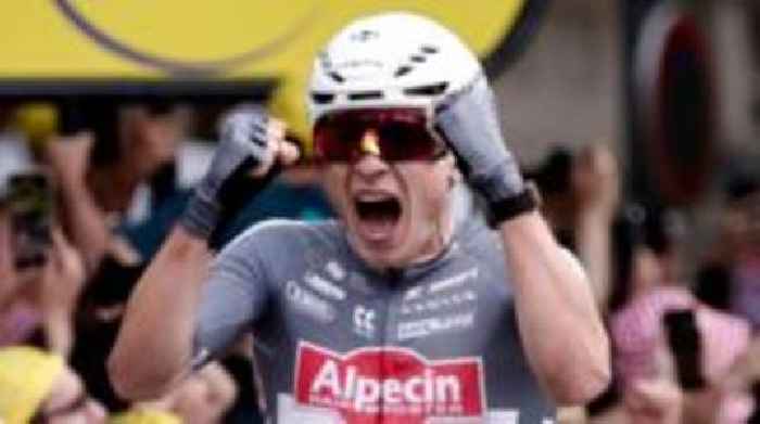 Philipsen wins Tour stage one to claim first yellow jersey