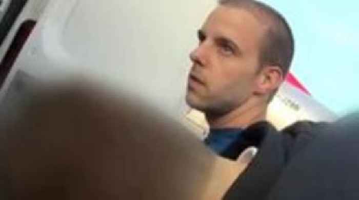 Moment murderer taken off plane and arrested