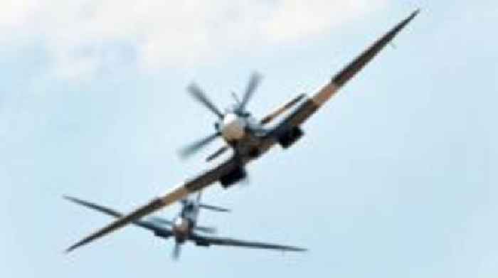 Car crushing and Spitfire displays at military show