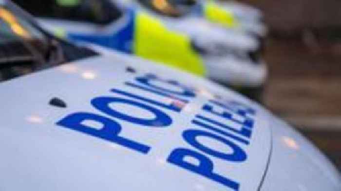 Man arrested after death of woman found injured on street