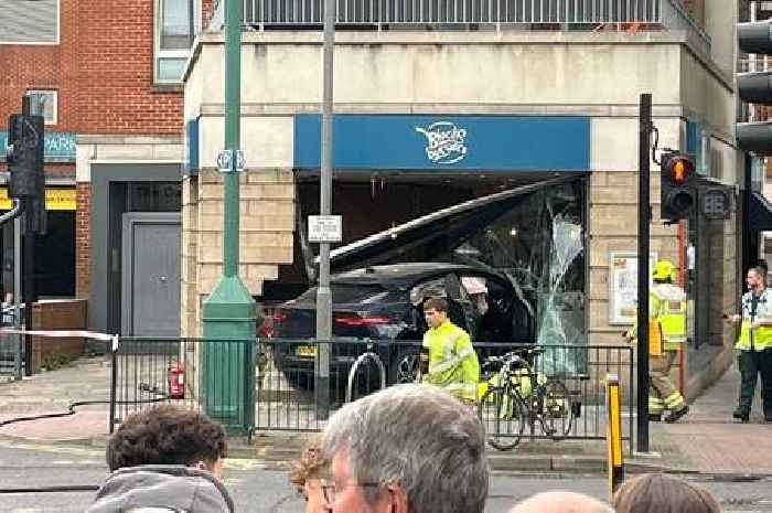 Motorcyclist taken to hospital after car crashes into restaurant