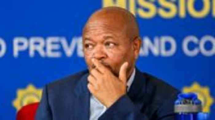 South Africa's police minister accused of links to criminal gangs