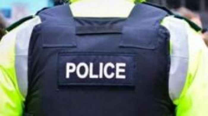 Arrest after man runs at police armed with machete