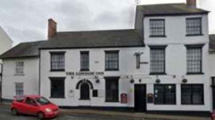 Man arrested over threat to burn pub-goer's home