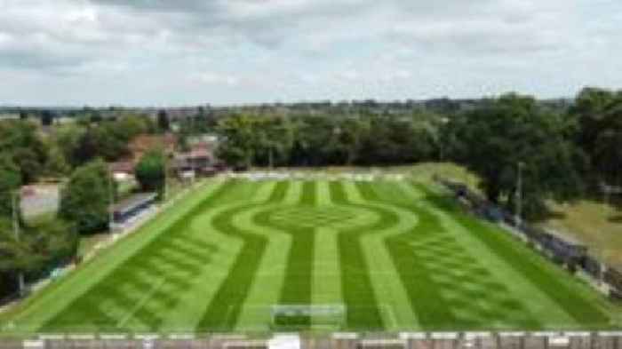 Pitch-perfect mowing by football groundsman