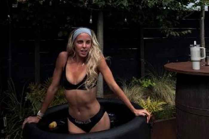 Golden girl Keely Hodgkinson shows off abs in ice bath as she cools off in scorching heat