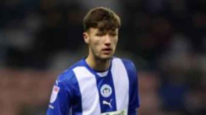 Wigan midfielder Payne returns to Oldham on loan
