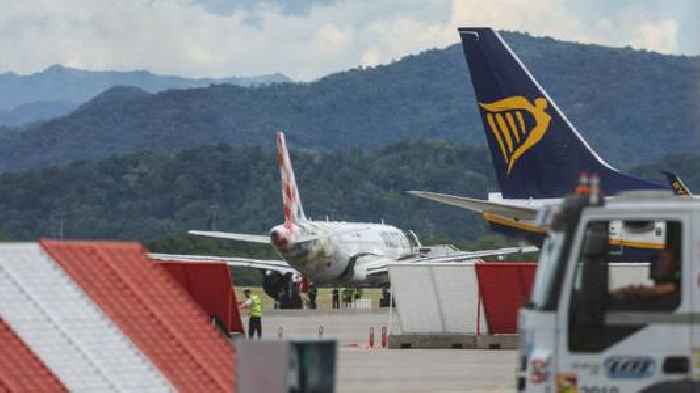 Flights suspended after man is sucked into plane engine on runway