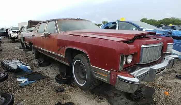 1976 Lincoln Town Car Sits in a Junkyard, Will It Ever Drive Out of There?