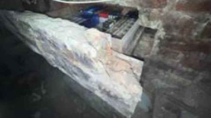 Cigarettes found stashed in hidden 'James Bond' wall operated by remote