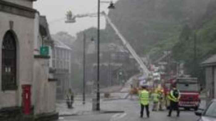 Historic hotel caught in fire looted a day later