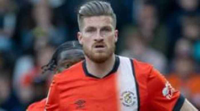 Charlton sign Luton defender Burke