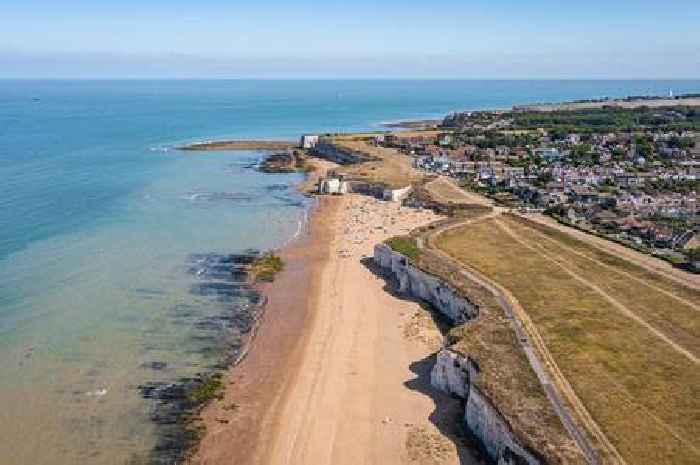 Enchanting south east UK beach with hidden caves at low tide