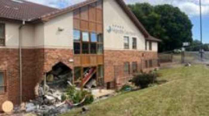 Eight in hospital after car crashes into care home
