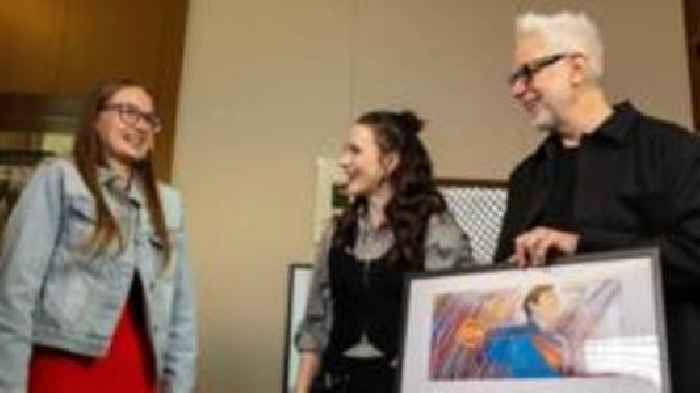 Girl designs Superman film age classification card